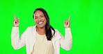 Smile, face and woman on green screen studio pointing up for mockup, space or product placement. Hands, portrait and lady gesture for deal announcement, promotion and advertising isolated copy space
