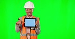Architect woman, tablet and green screen studio with pointing, tracking markers and smile by background. Architecture, mobile touchscreen and mock up with smile, portrait and design ux by backdrop