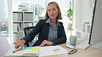 Appointment, schedule and a business asian woman writing in her diary while working at a desk in an office. Portrait, notebook and calendar with a female employee at work to write in a journal