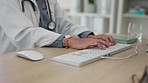 Woman, doctor and hands typing on computer keyboard for healthcare research, email or communication on office desk. Hand of female medical professional working on PC for health results at the clinic