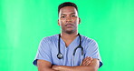 Face, nurse and black man with arms crossed on green screen in studio isolated on a background. Healthcare portrait, medical professional and serious, proud and confident surgeon from South Africa.