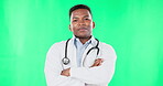 Face, doctor smile and black man with arms crossed on green screen in studio isolated on a background. Portrait, medical professional and happiness, proud and confident surgeon from South Africa.