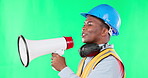 Talking, construction and black man with a megaphone on a green screen isolated on studio background. Announcement, speaking and an African architect giving instruction for maintenance and attention