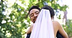 Park, wedding and man and woman hug for marriage ceremony, commitment and event in nature. Relationship, partnership and happy bride and groom in loving embrace for romance, celebration and love