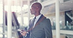 Business, phone and black man thinking in office, online browsing and research. Cellphone, lens flare and male professional with idea, web scrolling and contemplating on social media in workplace.