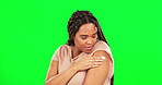 Green screen, vaccine and woman with plaster on arm for healthcare, covid and medical safety. Female model, bandage and injection of vaccination, virus immunity or healthy medicine for flu protection