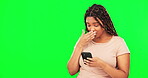 Phone, omg and mockup with a black woman on a green screen background in studio for communication. Mobile, contact and gossip with a female feeling surprised while typing a text message on chromakey