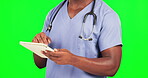 Black man, doctor hands and tablet on green screen, health and digital results on studio background. Male surgeon typing, tech and healthcare with medicine, online or electronic hospital schedule