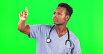 Green screen, black man and invisible touch isolated on studio background for healthcare, futuristic technology. Medical worker, nurse or person with software, application or digital hand gesture