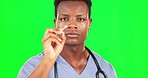 Cotton bud, black man face and doctor with green screen doing a a covid and healthcare test. Isolated, studio background and health exam of a male medical consultant checking for virus and illness