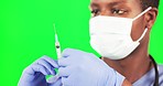 Covid, vaccine and doctor with needle in green screen studio for healthcare, help and treatment. Syringe, immunization and African male expert with injection for disease, prevention and flu shot