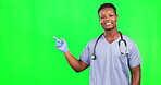 Happy man, face and doctor on green screen pointing to mockup in agreement, yes or approval. Portrait, black male and healthcare professional advertising deal, medical choice and trust of good review