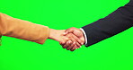 Handshake, partnership and closeup of business people, green screen and thank you for deal, agreement or trust. Studio, employees and shaking hands in HR collaboration, welcome and recruitment team