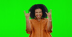 Portrait, rock and hand gesture with a woman on a green screen background in studio feeling crazy. Emoji, punk and horns with a happy female rocker on chromakey mockup looking excited for a concert