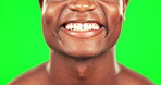 Black man, teeth and smile with dental on green screen, oral health with hygiene and closeup of mouth on studio background. Beauty, healthcare and grooming with happy male, face and orthodontics