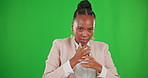 Business woman, portrait and strong on green screen with fist to fight and mockup. Face of professional, young and African entrepreneur person, CEO or boss focus on power muscle on studio background