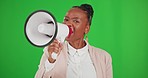 Face, attention and black woman with megaphone on green screen in studio isolated on a background mockup. Protest, screaming and portrait of person on loudspeaker for announcement, speech or justice.