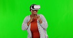 Black woman, virtual reality on green screen and esports with UX, mockup and future technology. Happy female boxing in metaverse, VR goggles and game with cyber and digital world on studio background