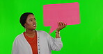 Black woman, grimace and speech bubble, green screen with social media promotion and advertising mockup. Promo, marketing and awkward female in portrait, shrug at announcement on studio background