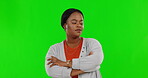 Negative, attitude and a woman arms crossed on a green screen background in studio feeling unhappy. Portrait, annoyed and bad with an african american female on chromakey mockup looking frustrated