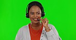 Black woman, callcenter and headset on green screen with phone call, consultant and communication. CRM, contact us and female agent, customer service or telemarketing with mockup on studio background