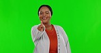 Recruitment, happy and a pointing black woman on a green screen isolated on a studio background. Smile, hiring and portrait of an African hr worker choosing with a gesture and making an decision