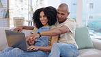 Laptop, couple and smile on sofa in home living room, social media or online shopping. Relax, computer and happiness of man and woman on couch web browsing, watching or streaming video together.