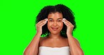 Face, green screen and woman with beauty, cotton pad and skincare routine on a studio background. Portrait, female person and model with makeup products, remove and cleaning with smile and self care