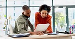 Collaboration, documents and business man and woman in office for meeting, talking and planning at desk. Teamwork, project advice and people with financial review, proposal strategy and paperwork