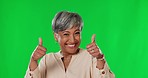 Face, thumbs up and senior woman on green screen for agreement, good job and promotion in studio. Emoji mockup, happy and portrait of isolated female with yes sign for thank you, support and success
