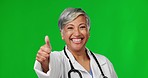 Green screen, doctor and face of woman with thumbs up for agreement, thank you and good news in studio. Healthcare, emoji mockup and portrait of happy lady for medical support, wellness and insurance