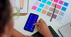 Creative woman, hands and phone on green screen with tracking markers in fashion design or color palette on desk. Hand of female clothing designer browsing or scrolling on smartphone mockup display