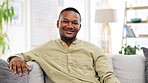 Smile, relax and face of black man on sofa at home on weekend, holiday and easy lifestyle. Apartment, calm and portrait of happy male on couch in living room for resting, comfortable and relaxation