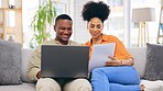 Black couple, laptop and documents for finance, mortgage or expenses on living room sofa together at home. Happy African man and woman working on computer with paperwork for payment or bills on couch