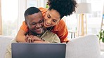 Couple, laptop and smile with hug on sofa in home living room, online browsing or web scrolling. Interracial, computer and happiness of black man and woman bonding on couch in lounge on social media.