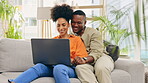 Laptop, couple and laughing in home living room, bonding and streaming funny comedy on sofa. Interracial, computer and happy black man and woman on social media, online browsing or scrolling for meme