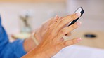 Phone, woman and hand on a social media app and texting in a house. Female, mobile communication and text of a person holding a cellphone typing on a internet and web conversation online through sms