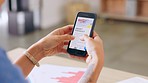 Phone, online shopping and woman hands browsing on a store website or the internet in her office. Technology, ecommerce and closeup of female employee scrolling on her cellphone in the workplace.