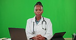 Medical, technology and a doctor black woman on a green screen background for online consulting. Portrait, healthcare and research with a female medicine professional you can trust for insurance