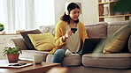 Relax, music and a woman with a credit card and laptop for online shopping, payment and ecommerce. Headphones, typing and Asian girl with information to pay for a web or retail service on a computer