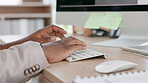 Black man, hands and typing email on computer keyboard for business communication or proposal at office desk. Hand of African male employee working on desktop PC for networking or project schedule