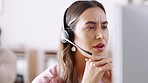 Business woman, call center and face consulting in customer service, telemarketing or support at the office. Serious female consultant or agent talking with headphones on computer for online advice