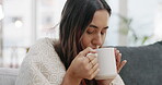 Sick woman drinking tea in home for flu, healing and recovery of cold, wellness and covid infection. Young female person drink cup of medicine for winter virus, illness treatment and health care 