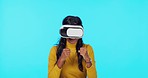 Virtual reality, boxing game and woman on blue background for ai, cyberspace and metaverse. Technology, online gaming and girl with vr glasses in studio for 3d games, user interface and boxer ui
