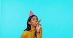 Party, birthday and woman in celebration feeling happy and excited isolated in a blue studio background with a kazoo. Celebrate, mockup and female winner with happiness, freedom and energy