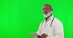 Medical, tablet and thinking with black man on green screen for medicine, research and idea mockup. Healthcare, technology and vision with doctor on studio background for idea, internet and digital 