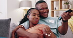 Young couple relax to watch movies on tv, news and cable show of media broadcast, sofa and popcorn. Happy man, woman and black people change television remote for streaming, subscription and smile