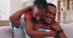 Happy couple, love and hug in living room home for care, happiness and quality time together. Man, woman and black people showing affection, support and relax in apartment, smile and romantic bonding