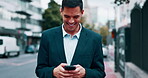 Happy man, business and smartphone in city typing, communication and chat with networking on commute. Travel, walking and mobile app with email, notification and social media, male outdoor and smile