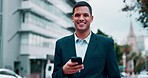 Phone, business man and face in the city with happiness and a smile from work. Urban road, employee and worker face busy with mobile networking and texting with blurred background by a street